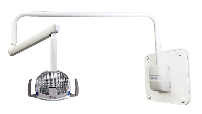 White wall-mounted dental operating light with adjustable arm and rectangular LED lamp head.